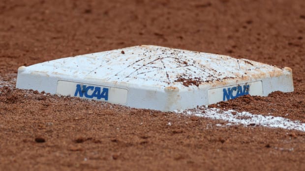 A close-up shot of a NCAA baseball base during a game.